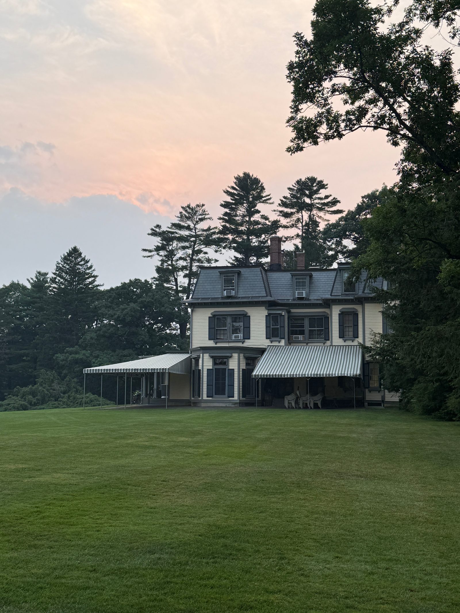 Original photo: a house on a lawn at dusk